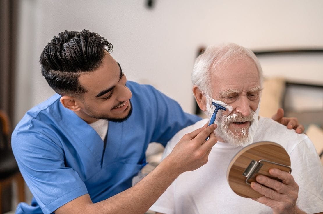 Professional caregiver caring for patient